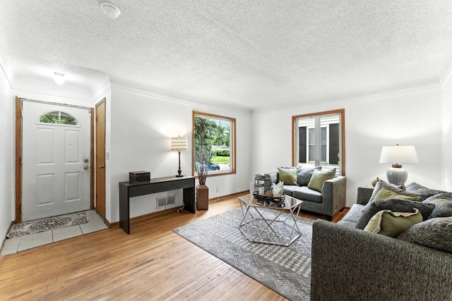 4951 Newton Ave N, Minneapolis, MN 55430 - living area with ornamental molding and light wood-style floors