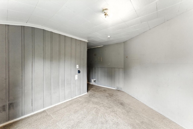 4951 Newton Ave N, Minneapolis, MN 55430 - spare room featuring carpet and lofted ceiling