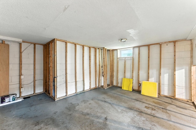 4951 Newton Ave N, Minneapolis, MN 55430 - below grade area featuring a textured ceiling