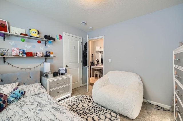 6908 101st St S, Cottage Grove, MN 55016 - bedroom featuring light colored carpet and baseboards