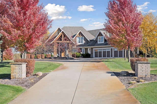 7530 Quail Ridge Trl, Greenfield, MN 55373 - view of front of home with a front lawn and concrete driveway