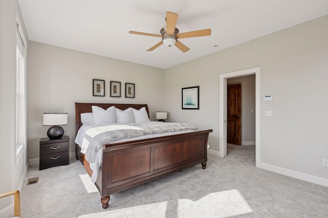 7530 Quail Ridge Trl, Greenfield, MN 55373 - bedroom with light colored carpet and a ceiling fan