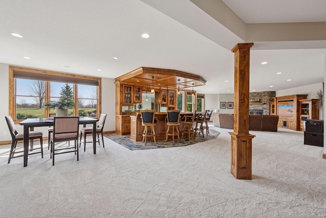 7530 Quail Ridge Trl, Greenfield, MN 55373 - dining space with light carpet, plenty of natural light, decorative columns, and recessed lighting