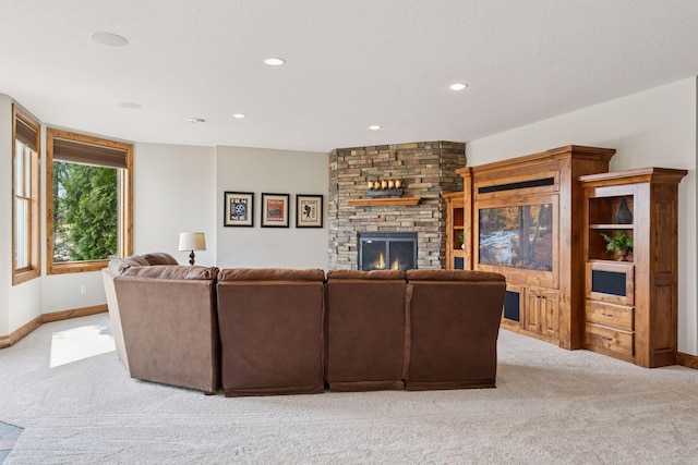 7530 Quail Ridge Trl, Greenfield, MN 55373 - living room with light colored carpet, a large fireplace, and recessed lighting