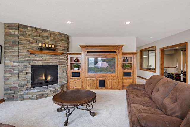 7530 Quail Ridge Trl, Greenfield, MN 55373 - carpeted living area featuring a stone fireplace and recessed lighting