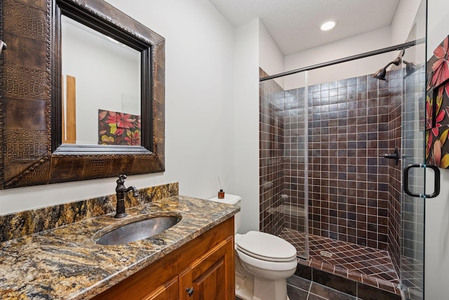 7530 Quail Ridge Trl, Greenfield, MN 55373 - full bath with a stall shower, vanity, recessed lighting, and a textured ceiling