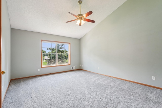 14916 Overlook Dr, Savage, MN 55378 - unfurnished room featuring carpet floors, lofted ceiling, ceiling fan, and a textured ceiling