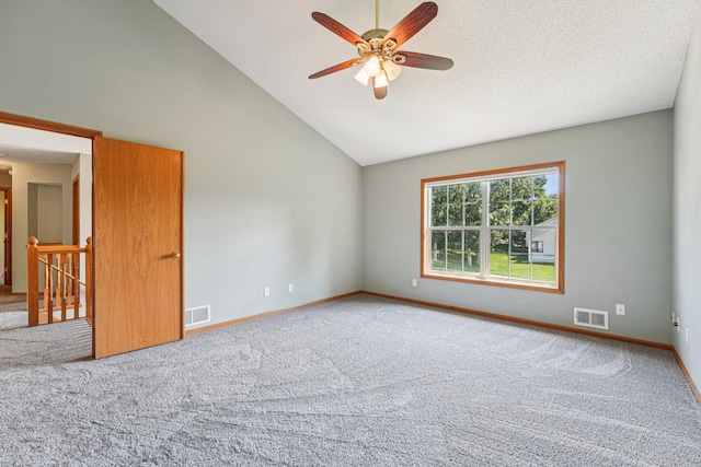 14916 Overlook Dr, Savage, MN 55378 - carpeted spare room featuring a ceiling fan and high vaulted ceiling