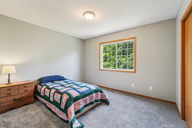 14916 Overlook Dr, Savage, MN 55378 - carpeted bedroom featuring a textured ceiling and baseboards