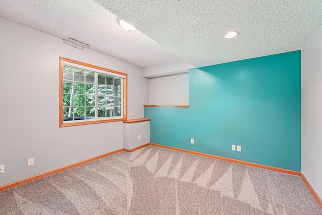 14916 Overlook Dr, Savage, MN 55378 - carpeted spare room featuring a textured ceiling and recessed lighting