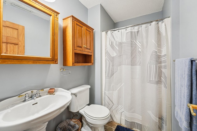 14916 Overlook Dr, Savage, MN 55378 - full bathroom with a sink and a shower with shower curtain