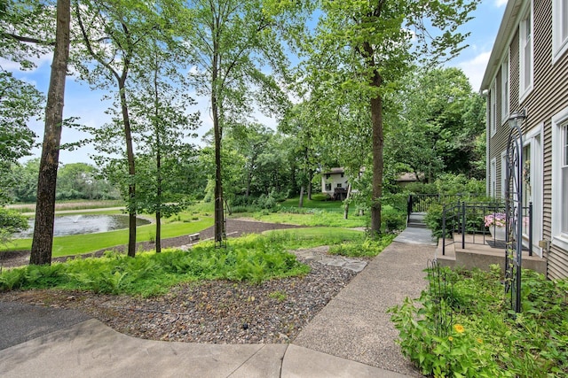2261 Ash St, Lino Lakes, MN 55110 - view of yard featuring a water view and view of wooded area