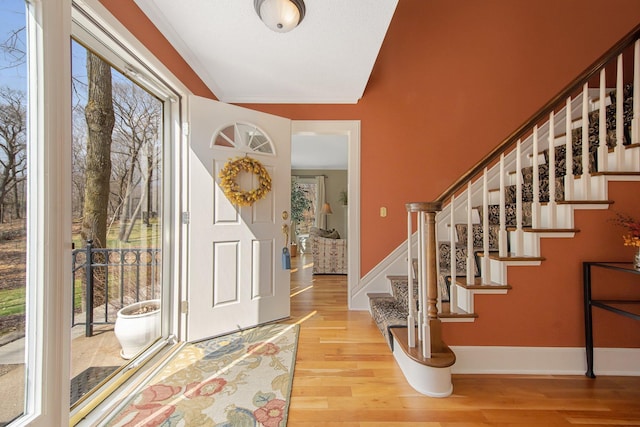 2261 Ash St, Lino Lakes, MN 55110 - entryway with plenty of natural light, wood finished floors, and stairway