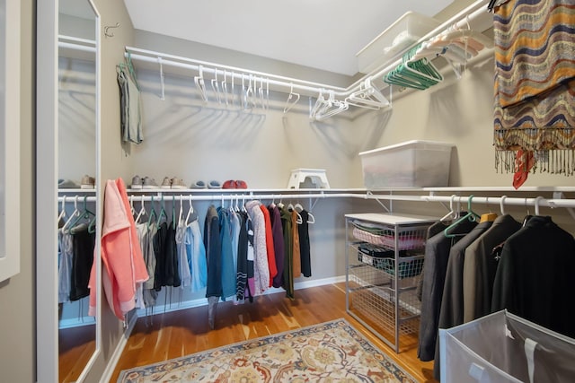 2261 Ash St, Lino Lakes, MN 55110 - spacious closet featuring wood finished floors