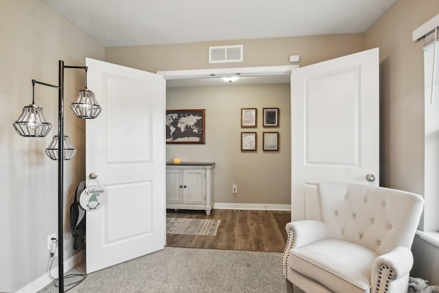 7516 Ochoa Ave NE, Otsego, MN 55330 - living area with baseboards and carpet flooring