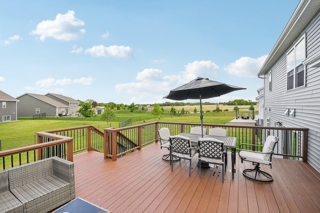 7516 Ochoa Ave NE, Otsego, MN 55330 - wooden deck featuring outdoor dining space and a fenced backyard