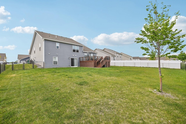 7516 Ochoa Ave NE, Otsego, MN 55330 - rear view of property with stairway, a wooden deck, and a gate