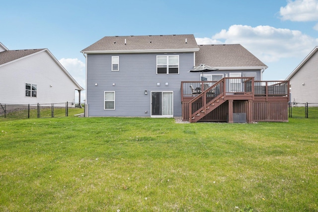 7516 Ochoa Ave NE, Otsego, MN 55330 - back of property with stairway, a wooden deck, and a shingled roof
