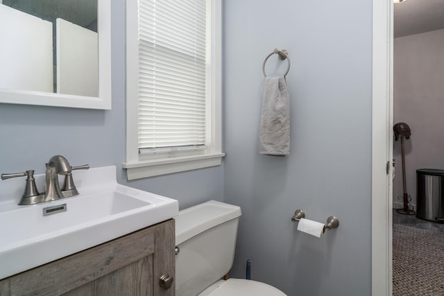 217 6th St, Crookston, MN 56716 - bathroom featuring vanity and toilet