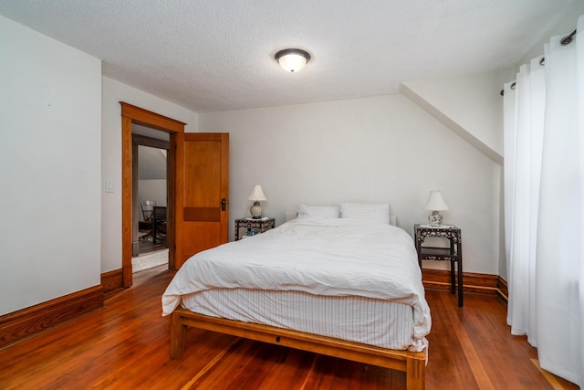 217 6th St, Crookston, MN 56716 - bedroom featuring hardwood / wood-style floors and baseboards