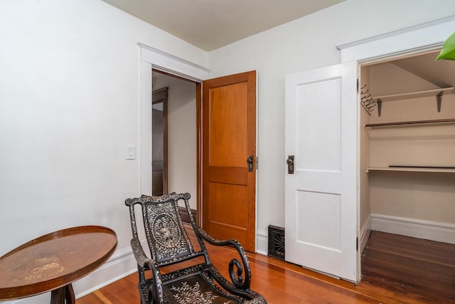 217 6th St, Crookston, MN 56716 - living area featuring wood finished floors and baseboards