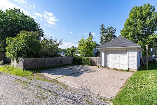 217 6th St, Crookston, MN 56716 - detached garage featuring concrete driveway