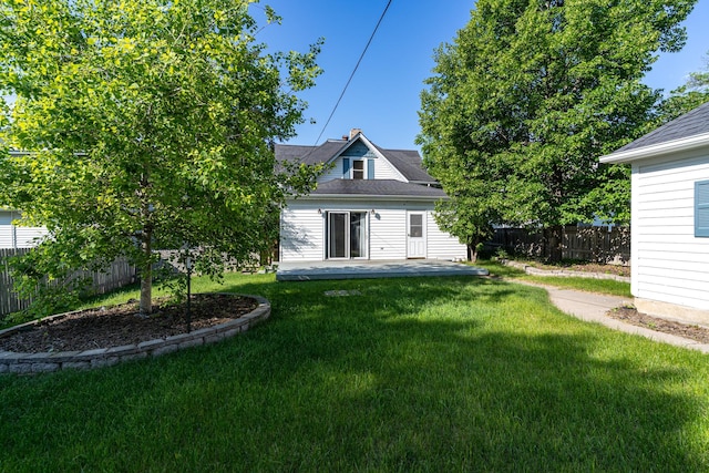 217 6th St, Crookston, MN 56716 - back of house featuring a patio area