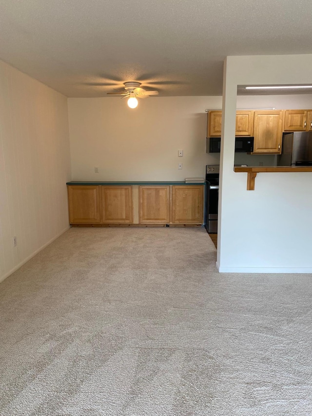 10113 34th St Unit 335, Minnetonka, MN 55305 - unfurnished living room with light colored carpet and ceiling fan