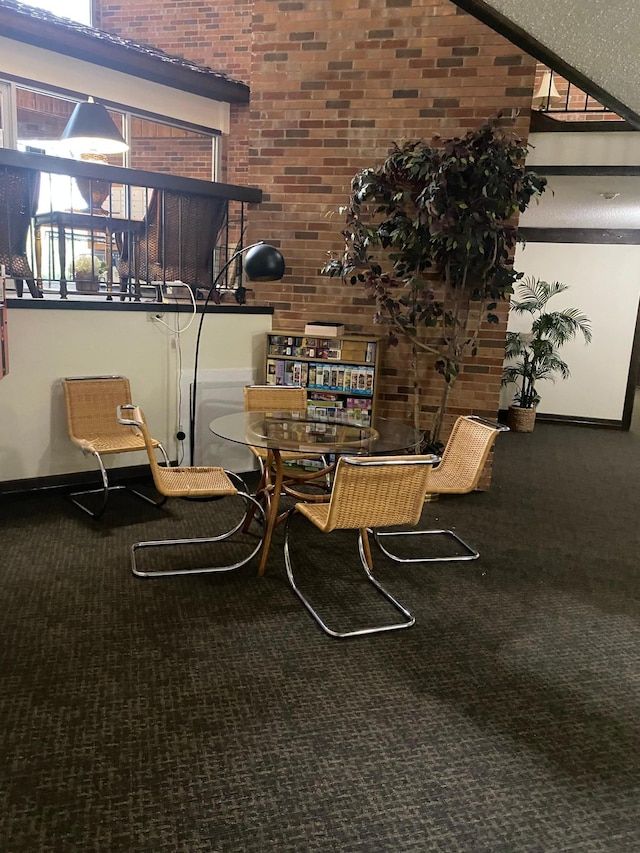 10113 34th St Unit 335, Minnetonka, MN 55305 - dining space featuring carpet flooring and brick wall