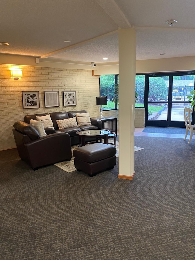 10113 34th St Unit 335, Minnetonka, MN 55305 - living room featuring brick wall, carpet, and beamed ceiling