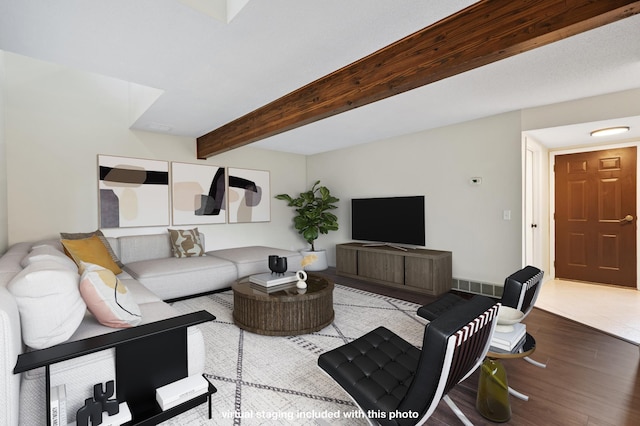 434 11th St Unit D, New Richmond, WI 54017 - living room with wood finished floors and beam ceiling