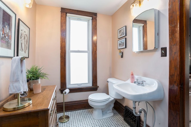 311 Fremont St, River Falls, WI 54022 - bathroom with toilet and baseboards