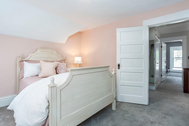311 Fremont St, River Falls, WI 54022 - carpeted bedroom with vaulted ceiling