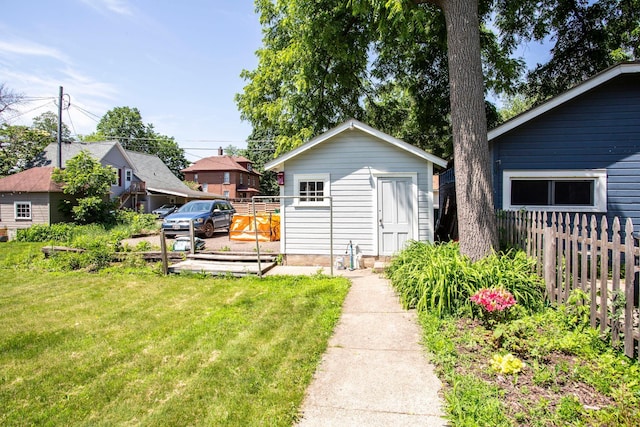 311 Fremont St, River Falls, WI 54022 - back of property featuring an outbuilding