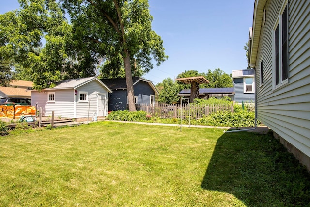311 Fremont St, River Falls, WI 54022 - view of yard featuring an outbuilding