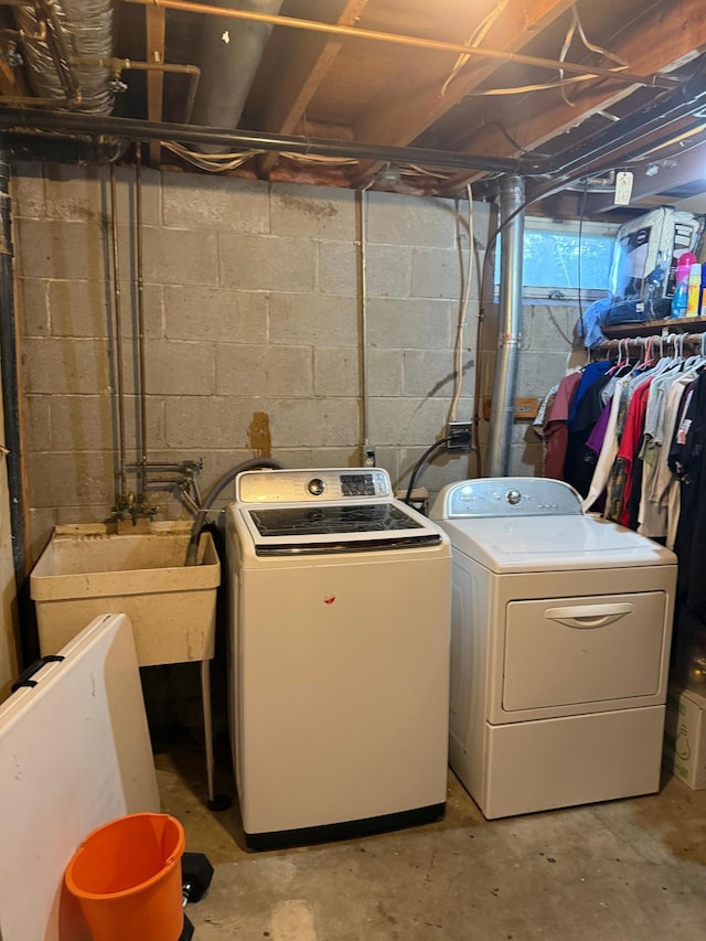 8208 Halifax Ct N, Brooklyn Park, MN 55443 - washroom with washing machine and clothes dryer