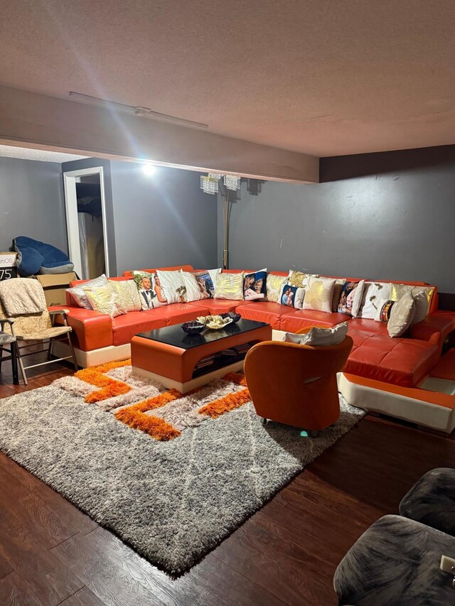 8208 Halifax Ct N, Brooklyn Park, MN 55443 - living room featuring wood finished floors and a textured ceiling