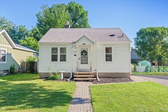 3506 Boardman St, Minneapolis, MN 55417 - view of front of home with entry steps and a chimney
