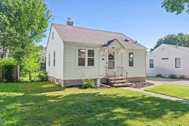 3506 Boardman St, Minneapolis, MN 55417 - view of front of property featuring a shingled roof and a chimney