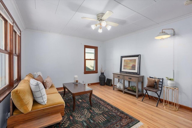 3506 Boardman St, Minneapolis, MN 55417 - living area with crown molding, wood finished floors, and a ceiling fan