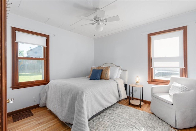 3506 Boardman St, Minneapolis, MN 55417 - bedroom featuring light wood finished floors and a ceiling fan
