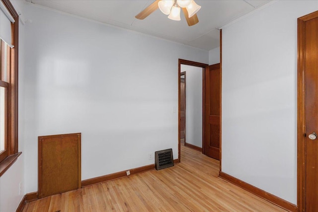 3506 Boardman St, Minneapolis, MN 55417 - unfurnished room with light wood finished floors, crown molding, and a ceiling fan