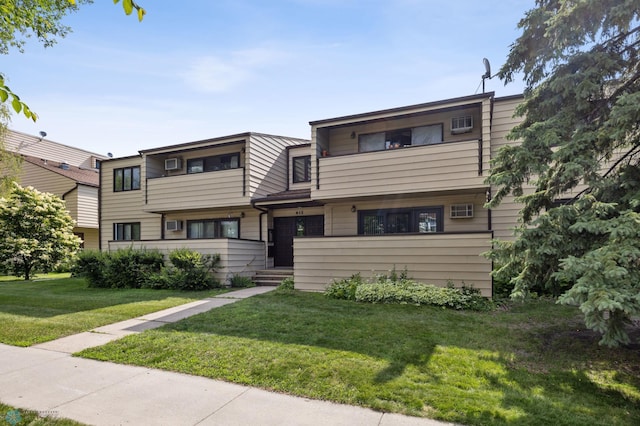 812 10th St S Unit B12, Fargo, ND 58103 - multi unit property featuring a front lawn and a balcony