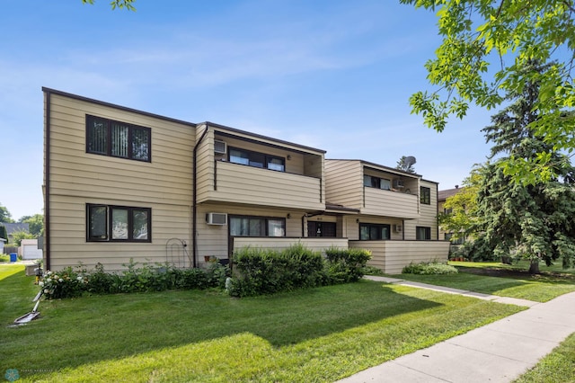 812 10th St S Unit B12, Fargo, ND 58103 - view of building exterior featuring a wall mounted air conditioner