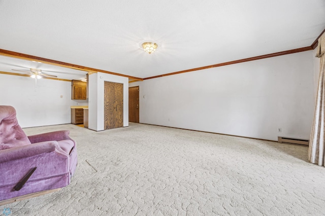 812 10th St S Unit B12, Fargo, ND 58103 - carpeted living area featuring a baseboard heating unit and crown molding