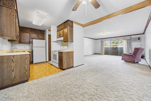 812 10th St S Unit B12, Fargo, ND 58103 - kitchen featuring white appliances, open floor plan, light colored carpet, crown molding, and light countertops