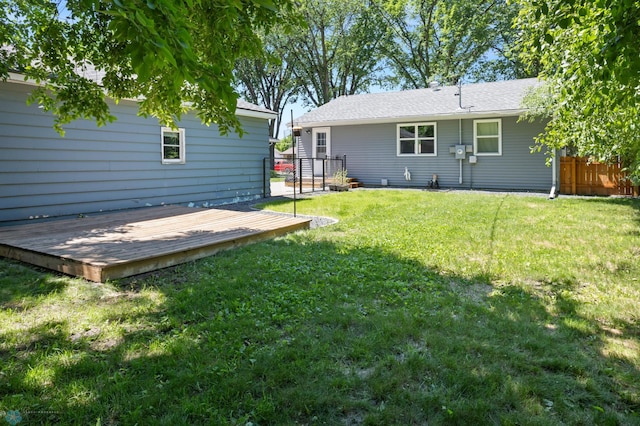 1706 14 1/2 St S, Fargo, ND 58103 - back of house featuring a deck