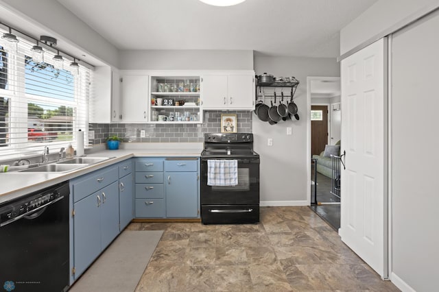 1706 14 1/2 St S, Fargo, ND 58103 - kitchen with black appliances, tasteful backsplash, blue cabinetry, white cabinets, and light countertops