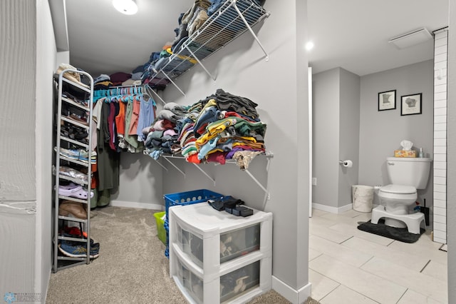 1706 14 1/2 St S, Fargo, ND 58103 - walk in closet with tile patterned flooring
