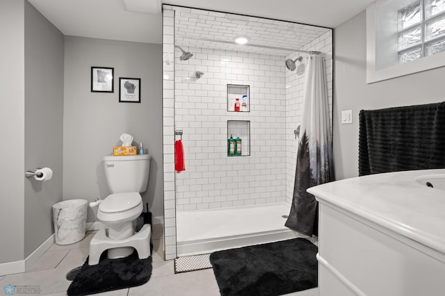 1706 14 1/2 St S, Fargo, ND 58103 - full bath featuring vanity, tile patterned floors, and a tile shower